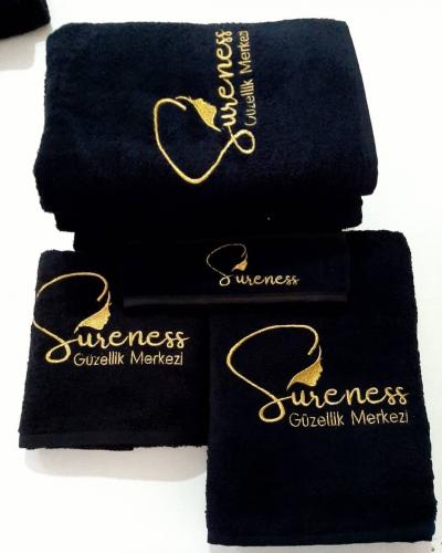 totpan siyah havlu logo nakışlı üretimi